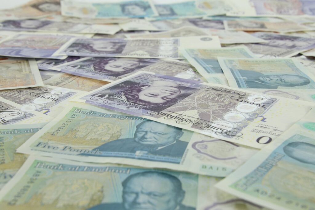 Pile of UK banknotes, illustrating the Autumn Budget