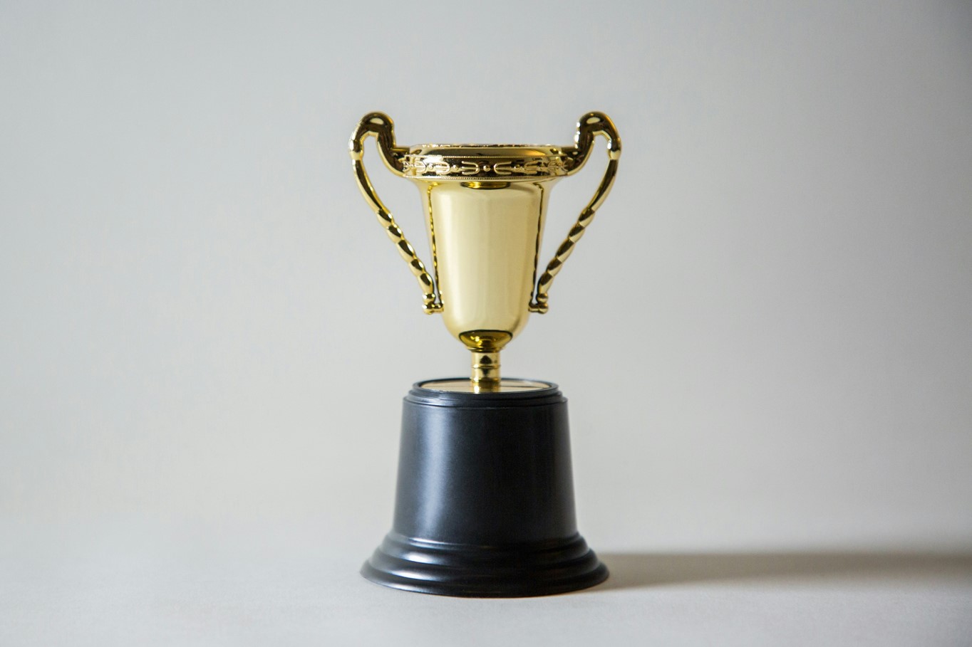 Small gold trophy on a black base