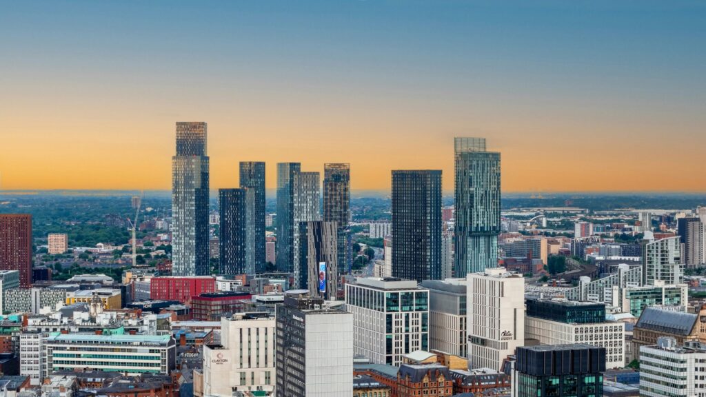 Manchester city skyline at sunset