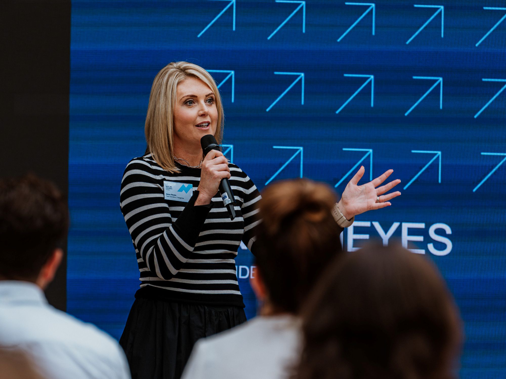 Anna Heyes speaking on stage at the Tech Climbers Greater Manchester launch event