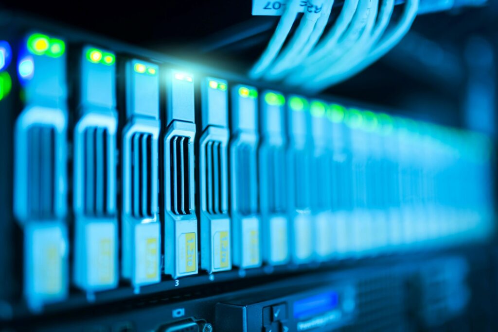 Close-up of network cables and servers in a data centre