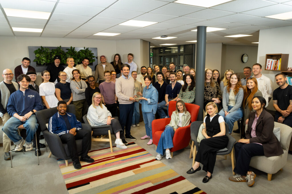Tangerine team group photo in the office