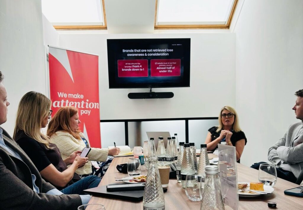 Real estate roundtable discussion in the Tangerine meeting room