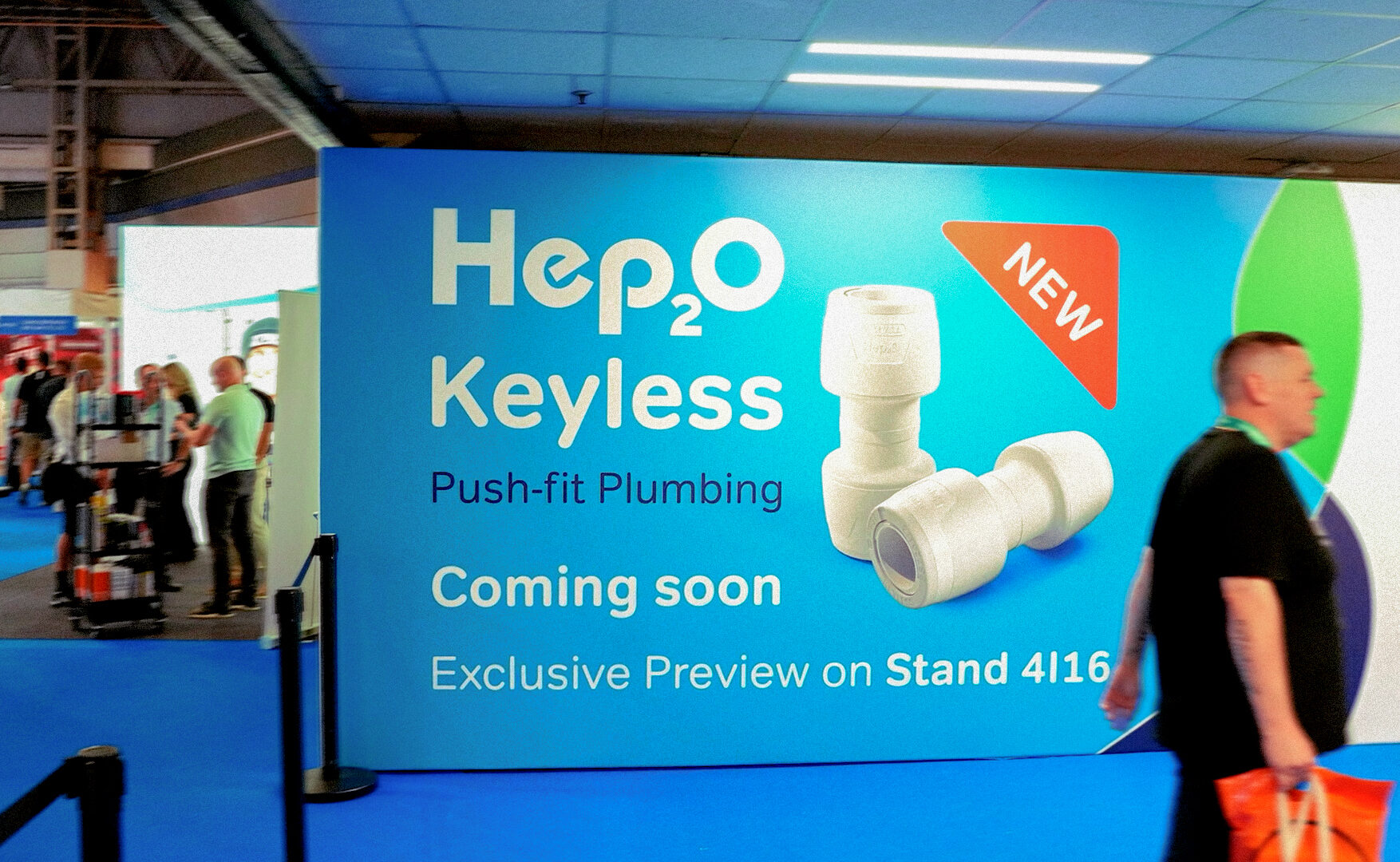 Wavin Hep2O Keyless push-fit plumbing banner at a trade show